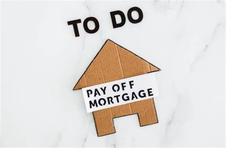 Is it better to pay off mortgage at beginning or end of year?